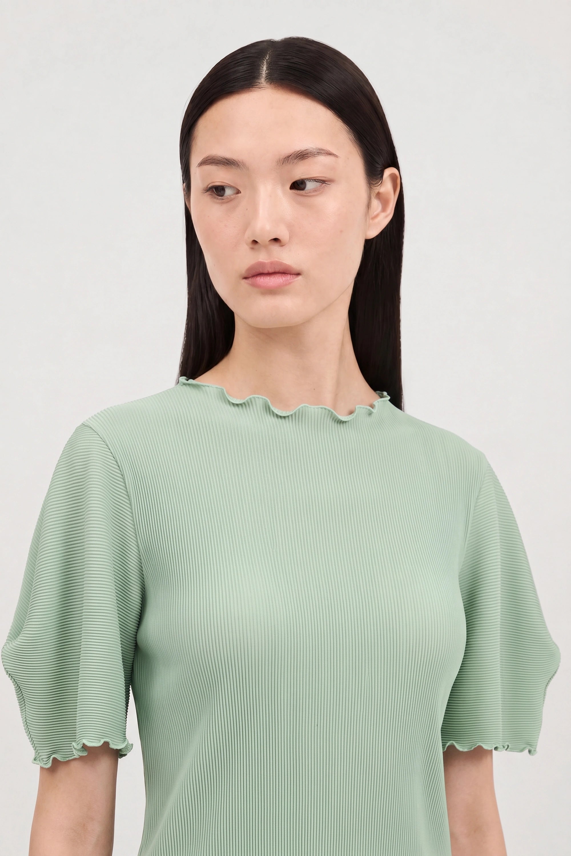 Green ribbed mock neck blouson sleeve top_3