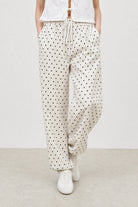 Ivory and black polka dot linen blend slouchy trousers_1