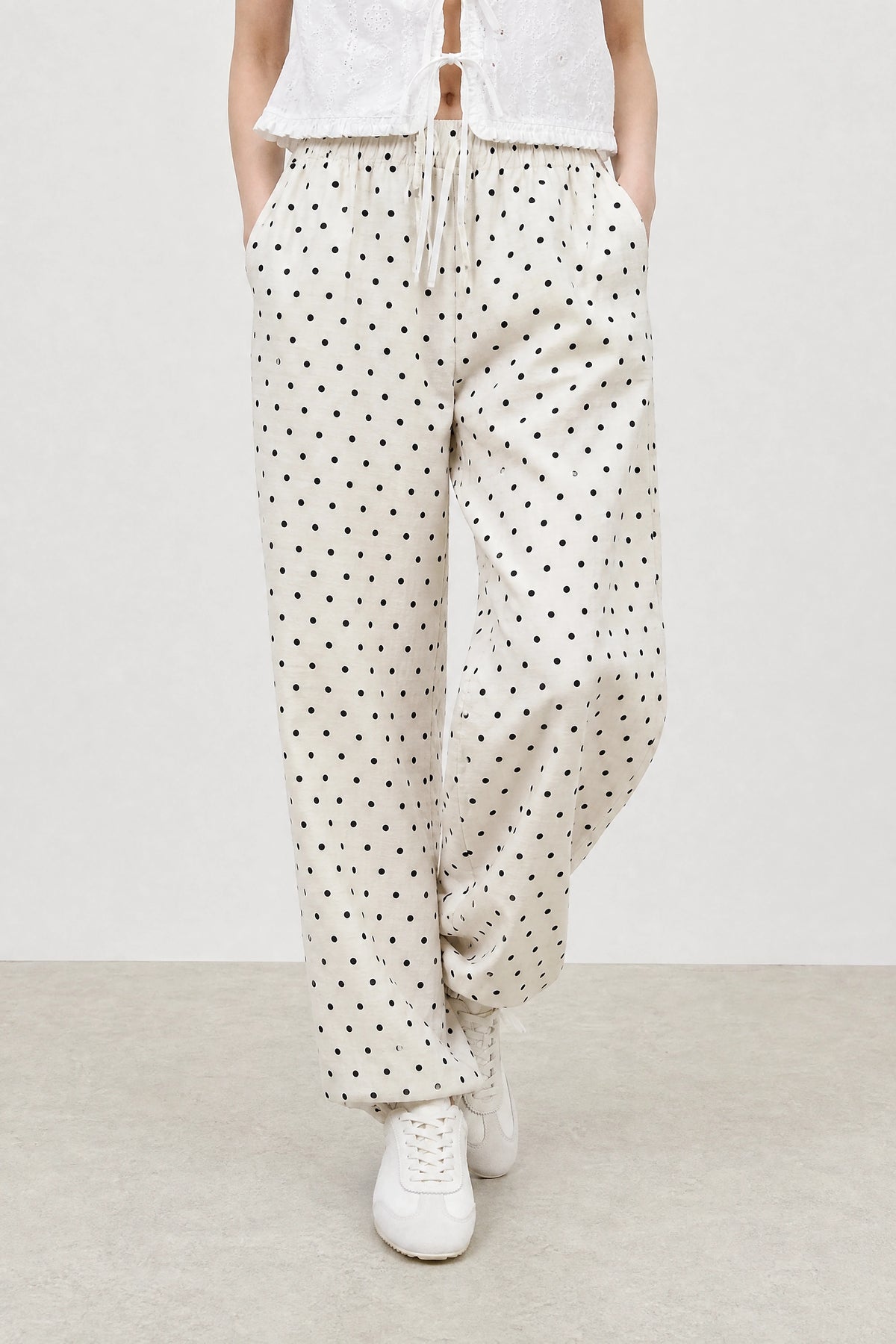 Ivory and black polka dot linen blend slouchy trousers_1