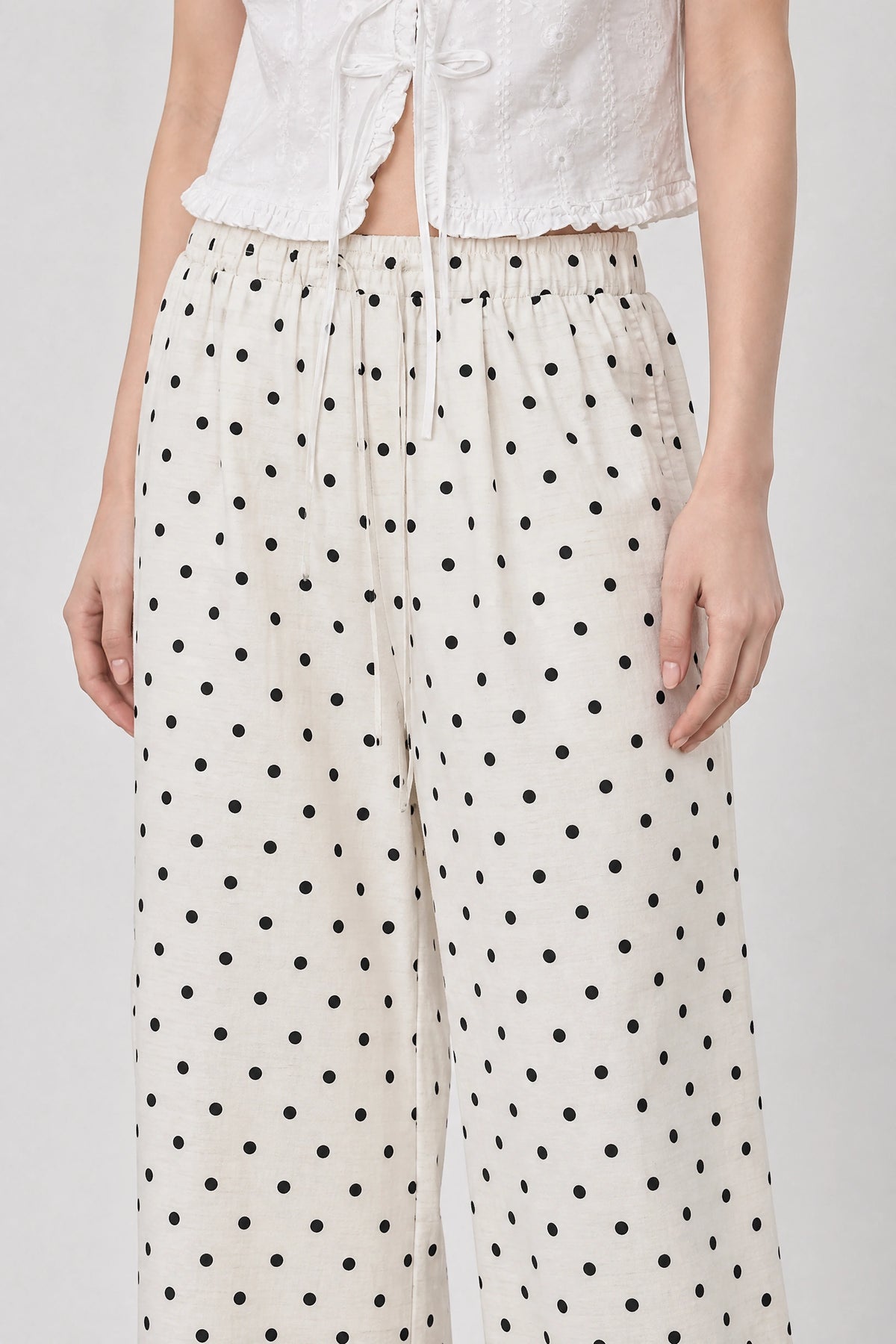 Ivory and black polka dot linen blend slouchy trousers_3