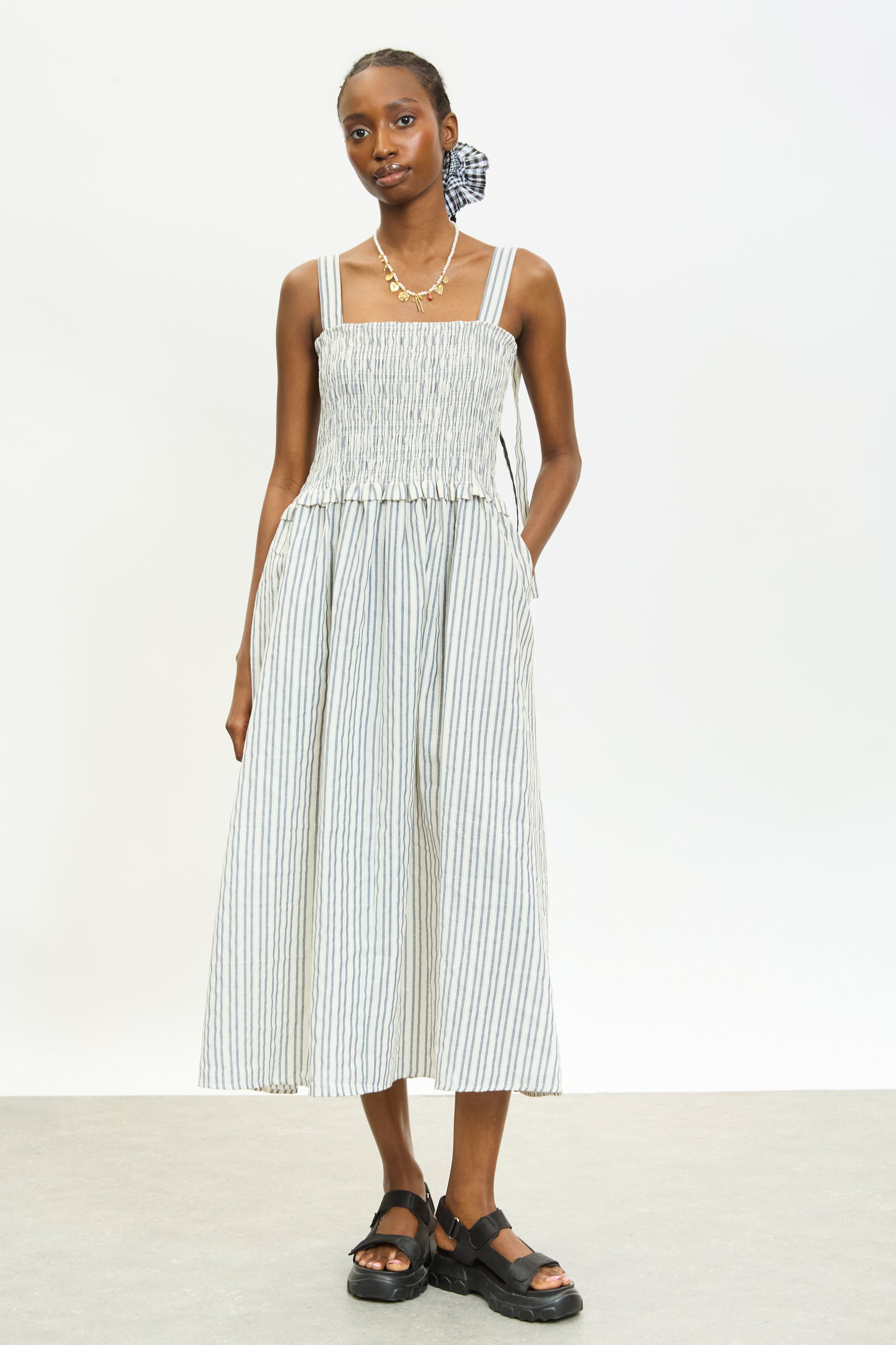 Ivory and blue vertical striped ruched bodice dress | Glassworks London Ivory and blue vertical striped ruched bodice dress | Glassworks London