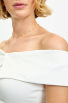 Ivory cross panel off shoulder jersey top_3