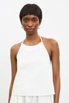 Ivory open back halter neck top_1