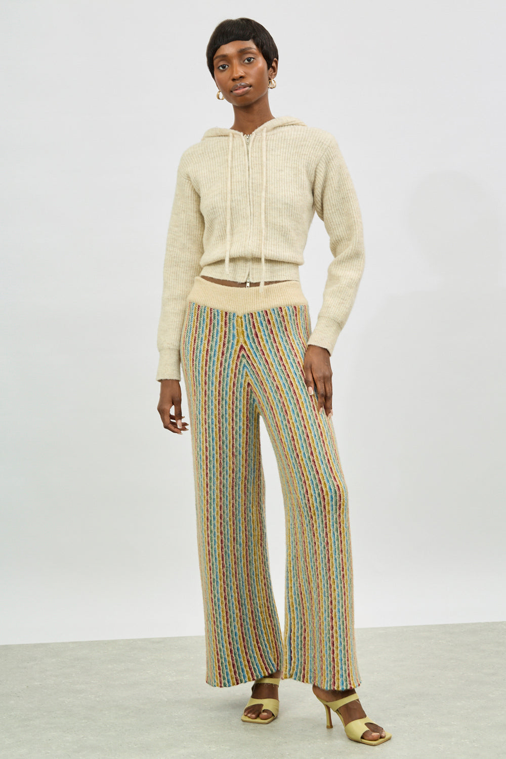 Ivory rainbow striped wool blend knit trousers