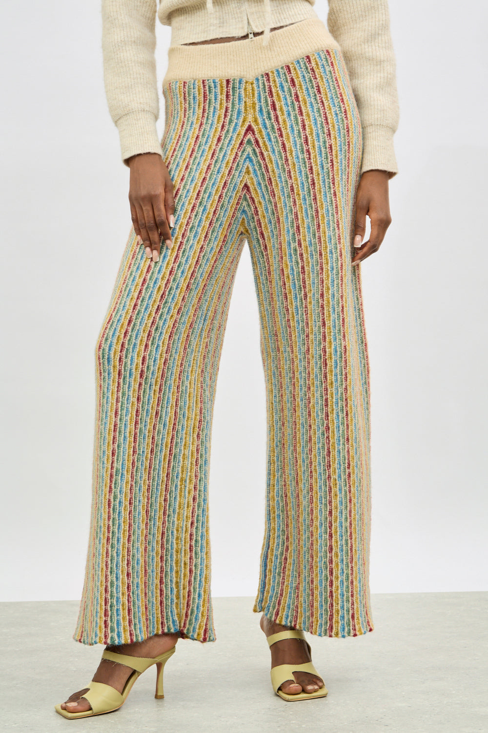 Ivory rainbow striped wool blend knit trousers