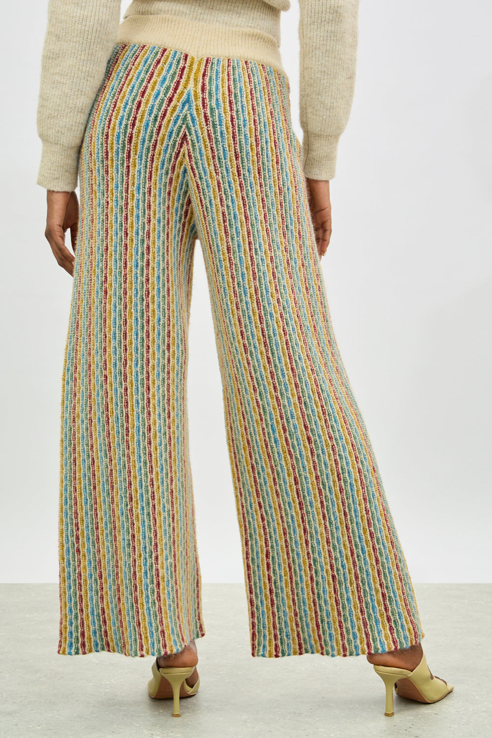 Ivory rainbow striped wool blend knit trousers