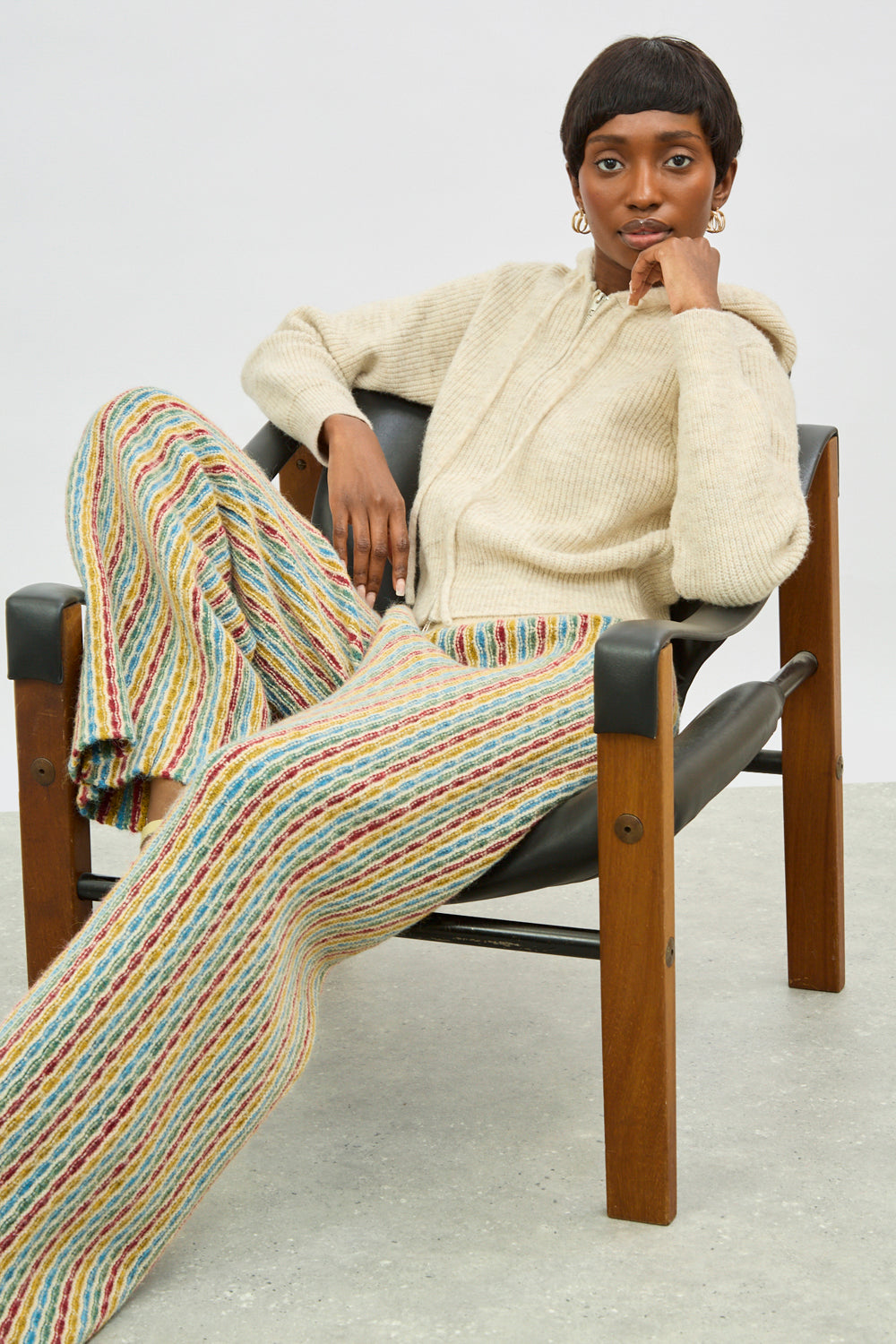 Ivory rainbow striped wool blend knit trousers