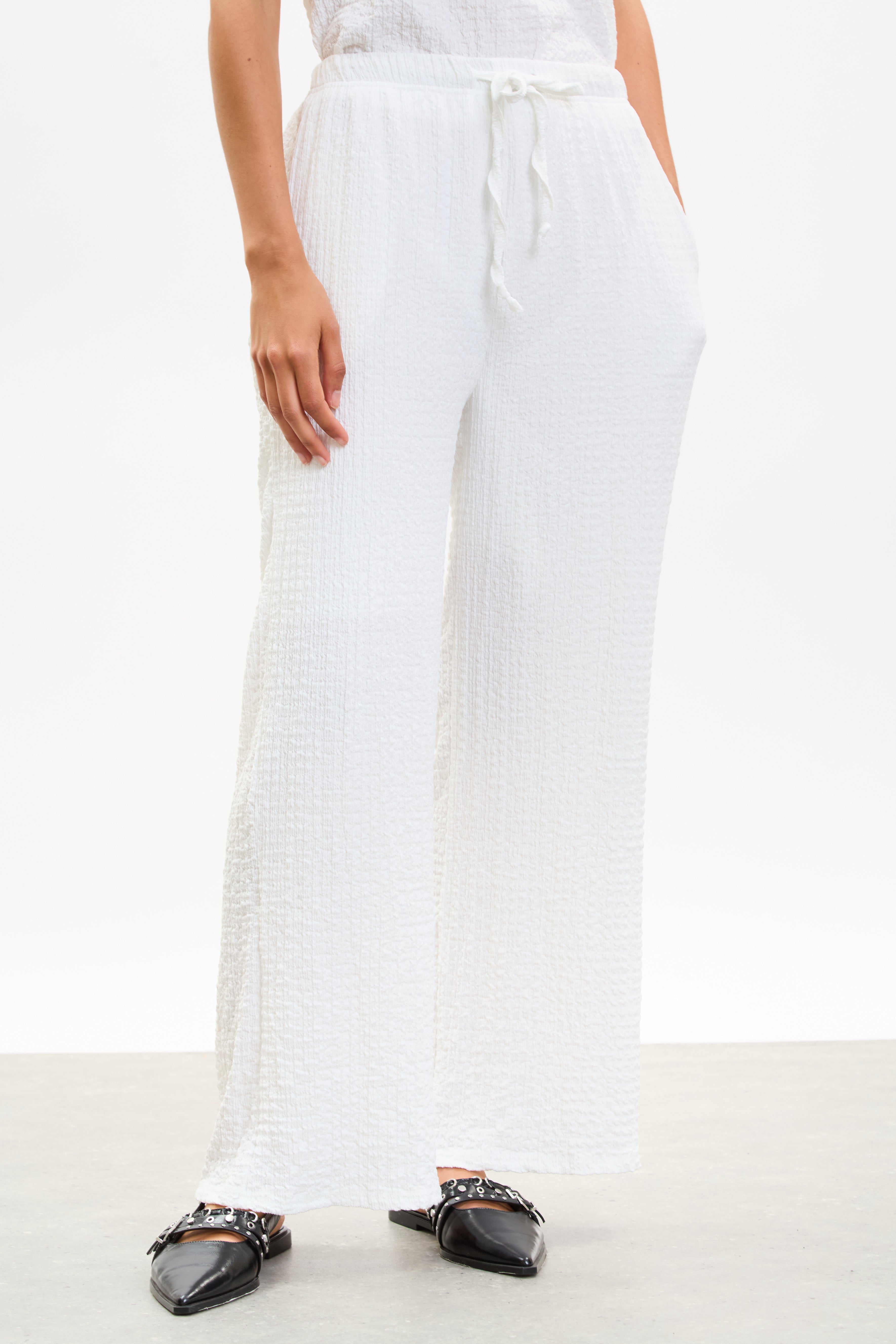 Ivory textured trousers_1