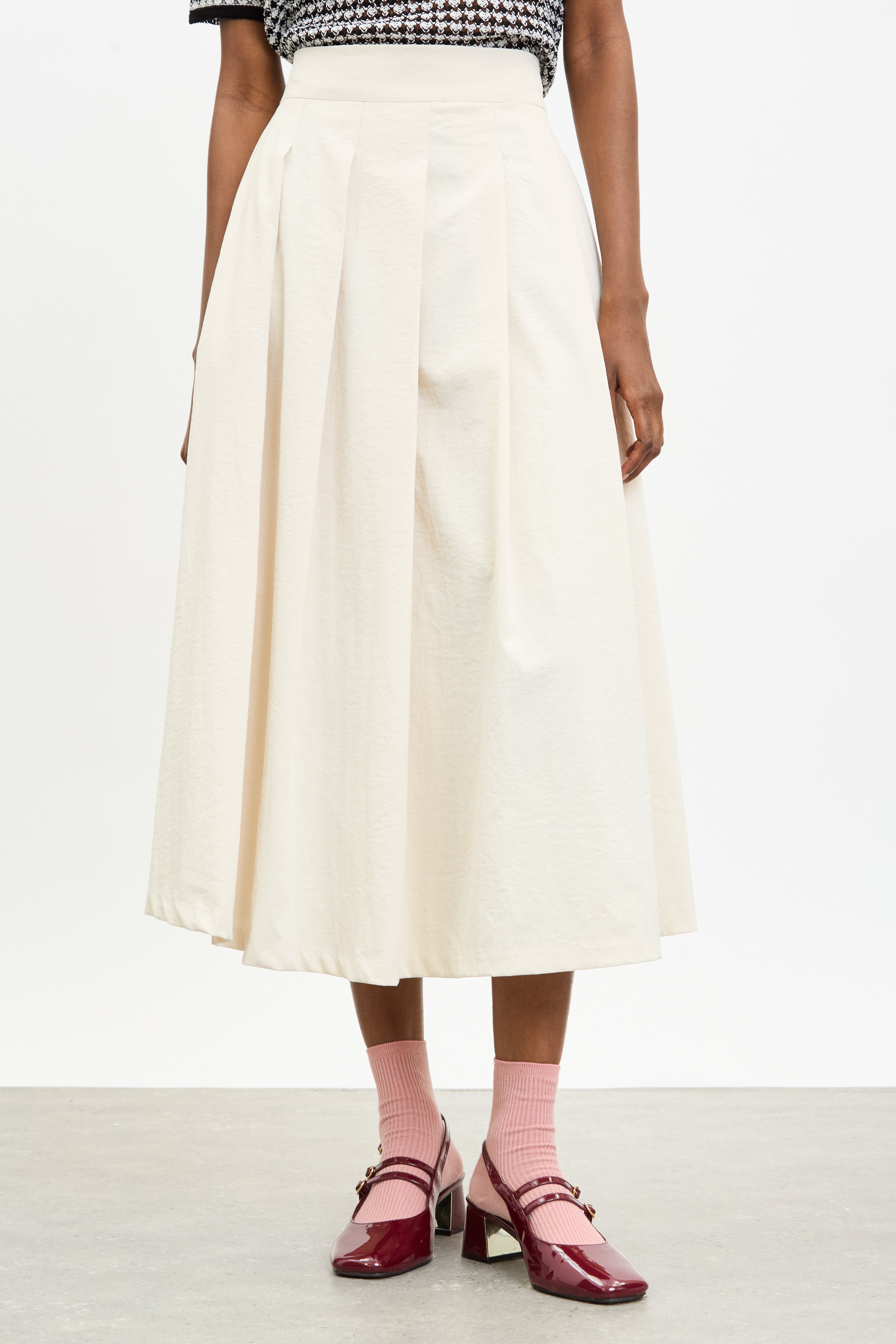 Light beige pleated waist midi skirt_1