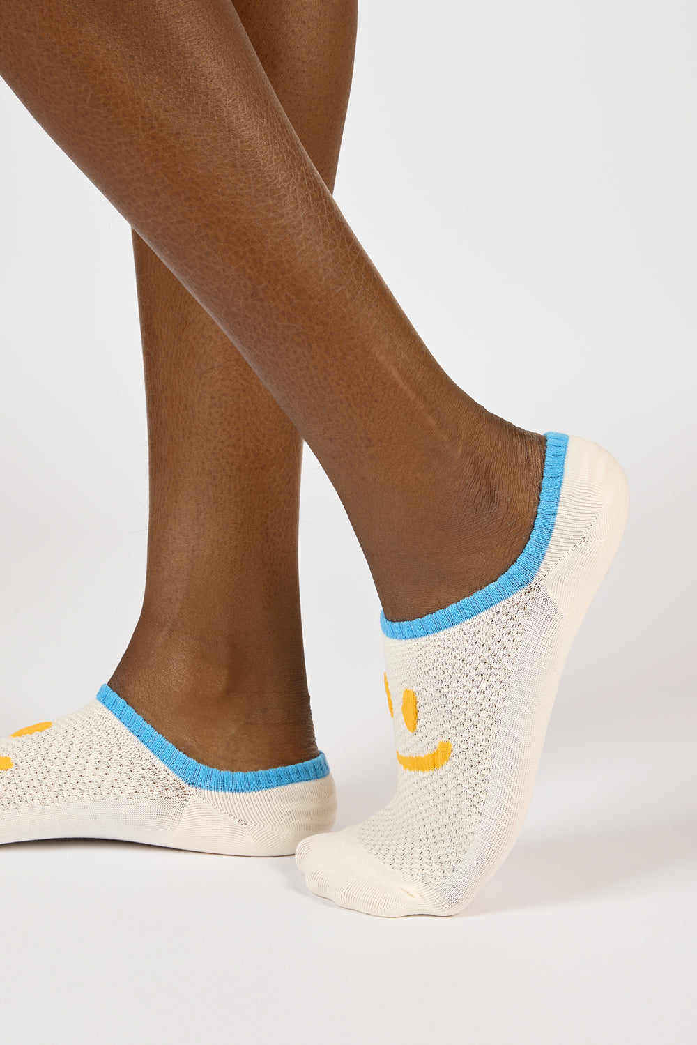 Pale yellow and blue giant smiley face pop socks_4