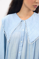 Light blue large eyelet trim collar blouse_4