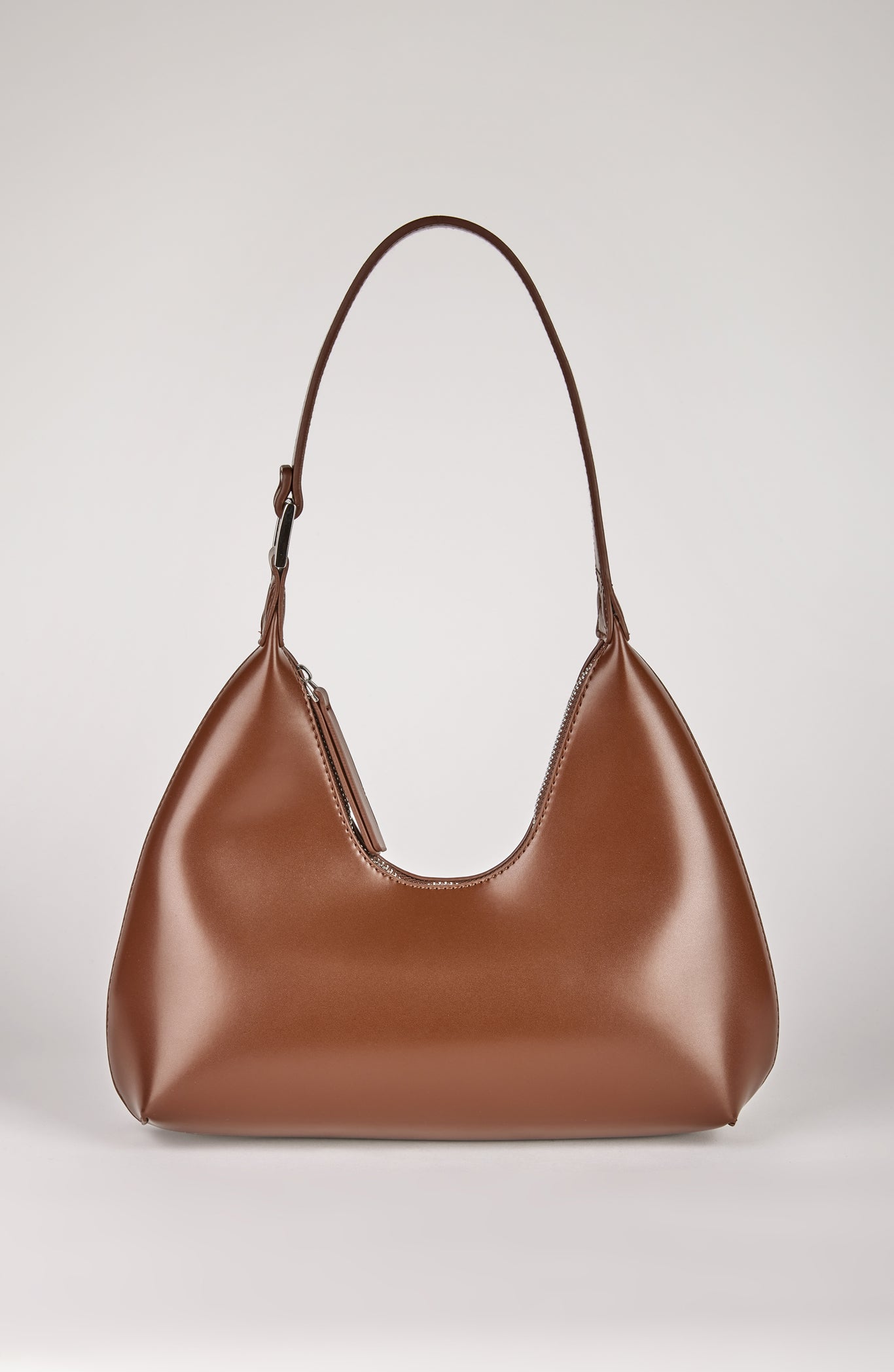 Light brown vegan leather shaped shoulder bag