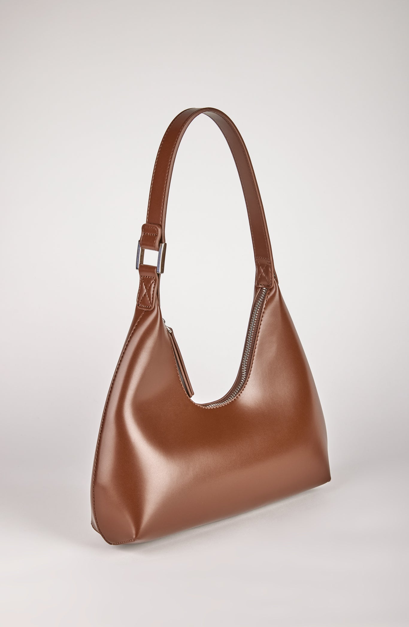 Light brown vegan leather shaped shoulder bag