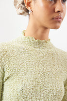 Lime green textured long sleeve mock neck top_3
