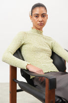 Lime green textured long sleeve mock neck top_5