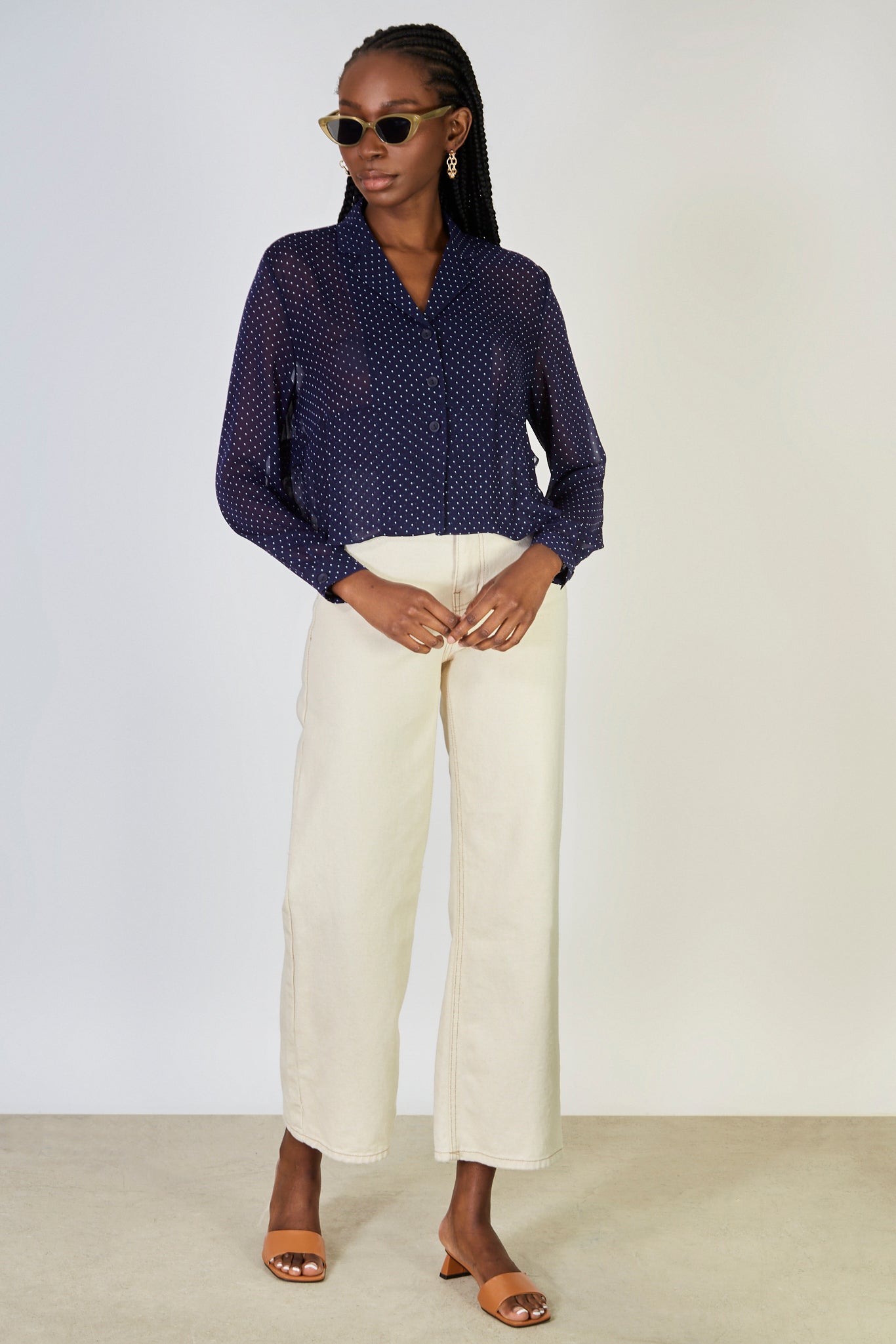 Navy blue and white polka dot semi sheer blouse | Glassworks London