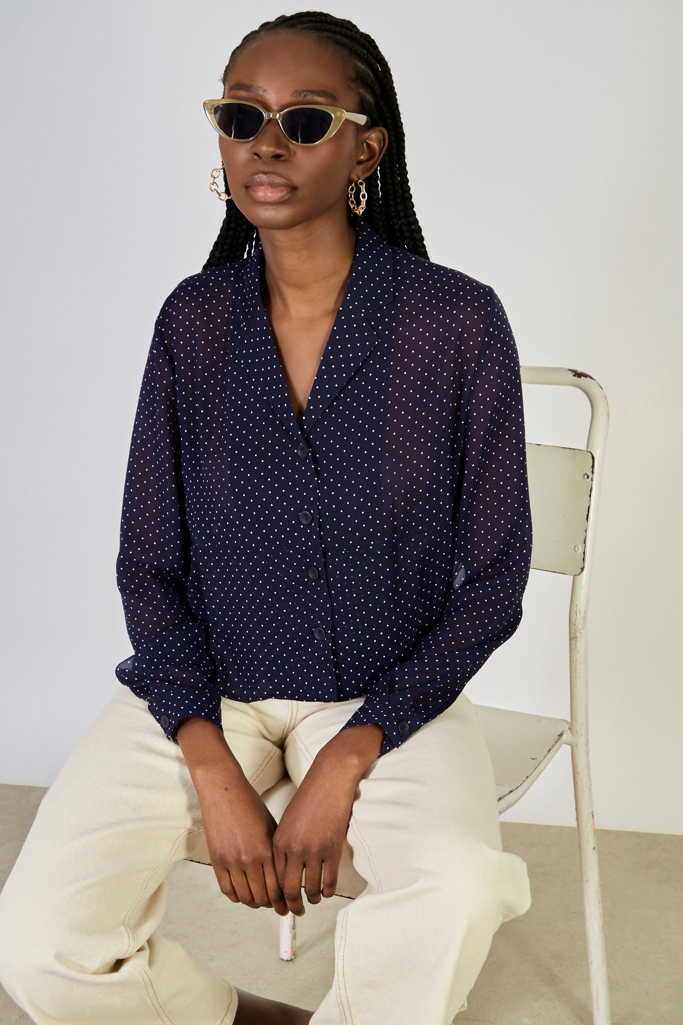 Navy blue and white polka dot semi sheer blouse | Glassworks London