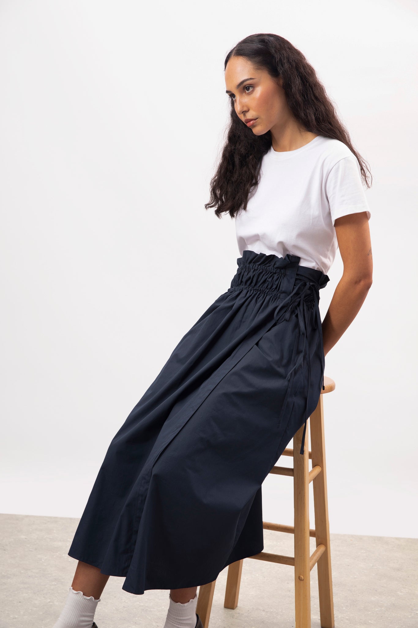 Navy blue double cinch side tie wrap skirt | Glassworks London Navy blue double cinch side tie wrap skirt | Glassworks London