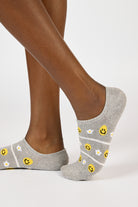 Pale grey smiley face daises socks_1
