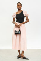 Pale pink and black puff sleeve dress_1