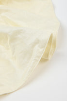 Pale yellow shimmery smooth scrunchie_2