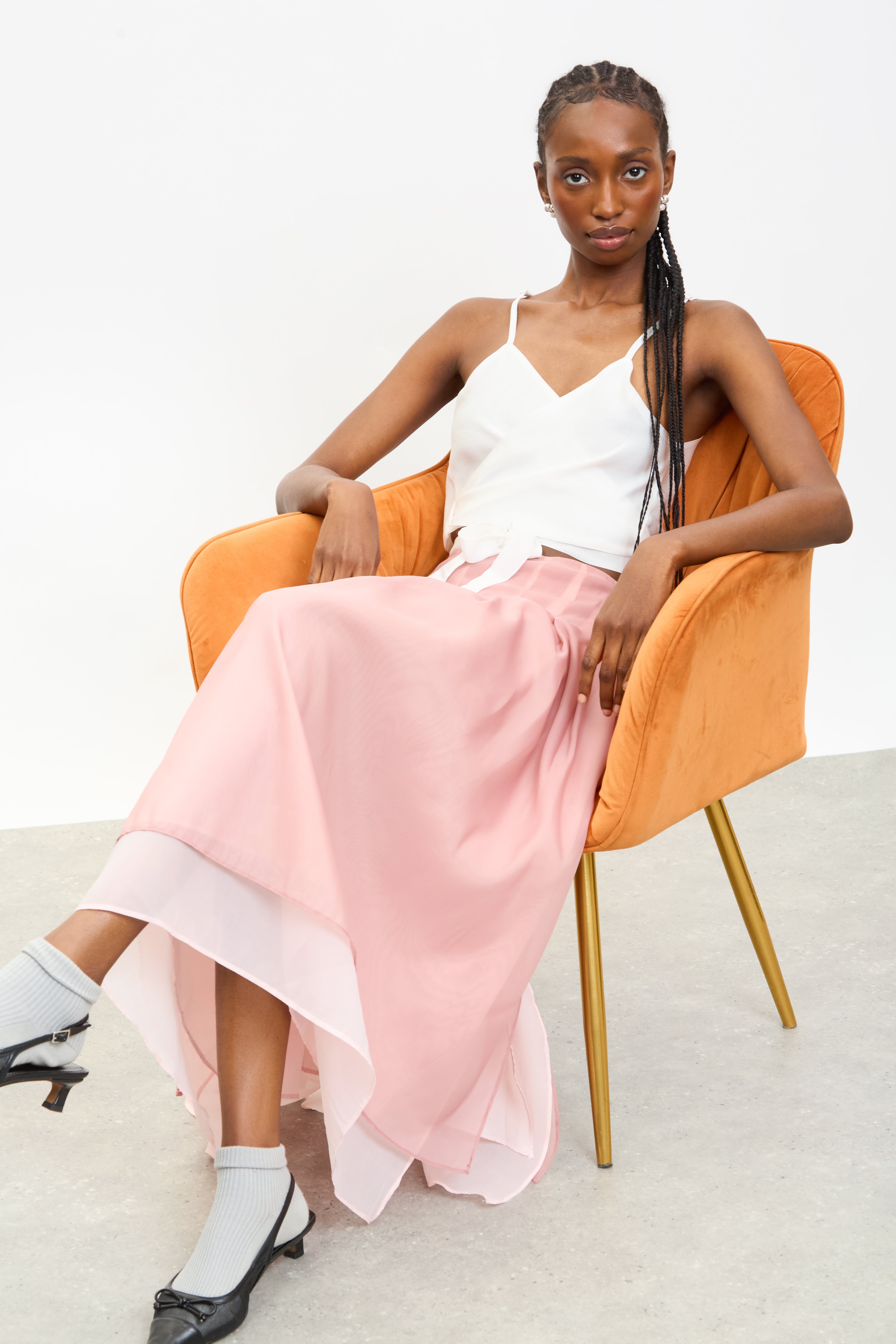 Pink chiffon overlay pleated skirt | Glassworks London