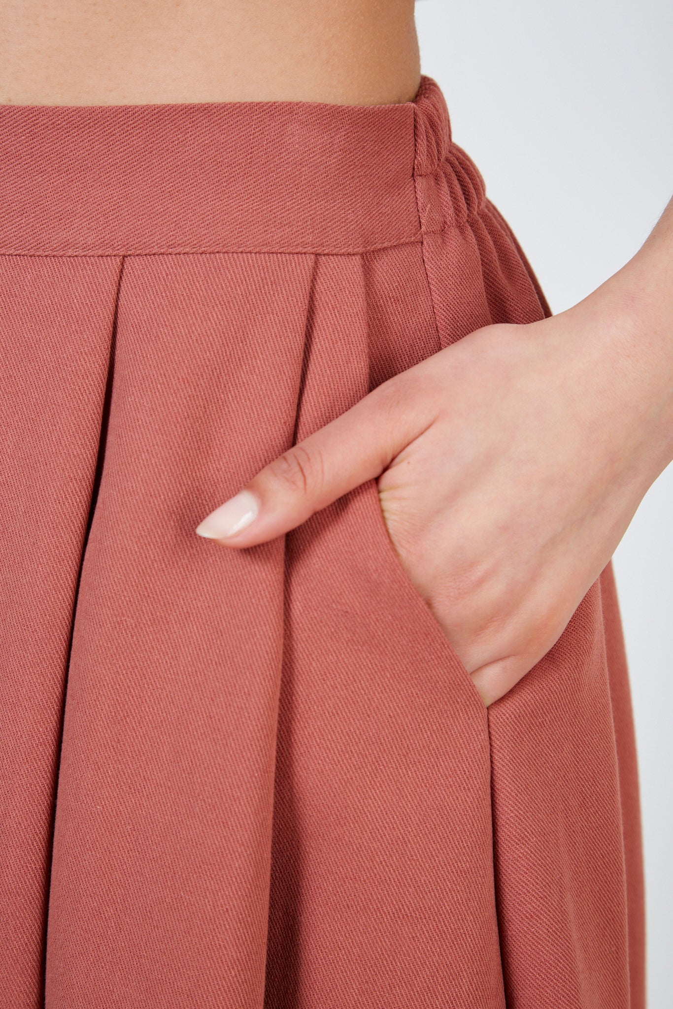 Rust red pleated skirt