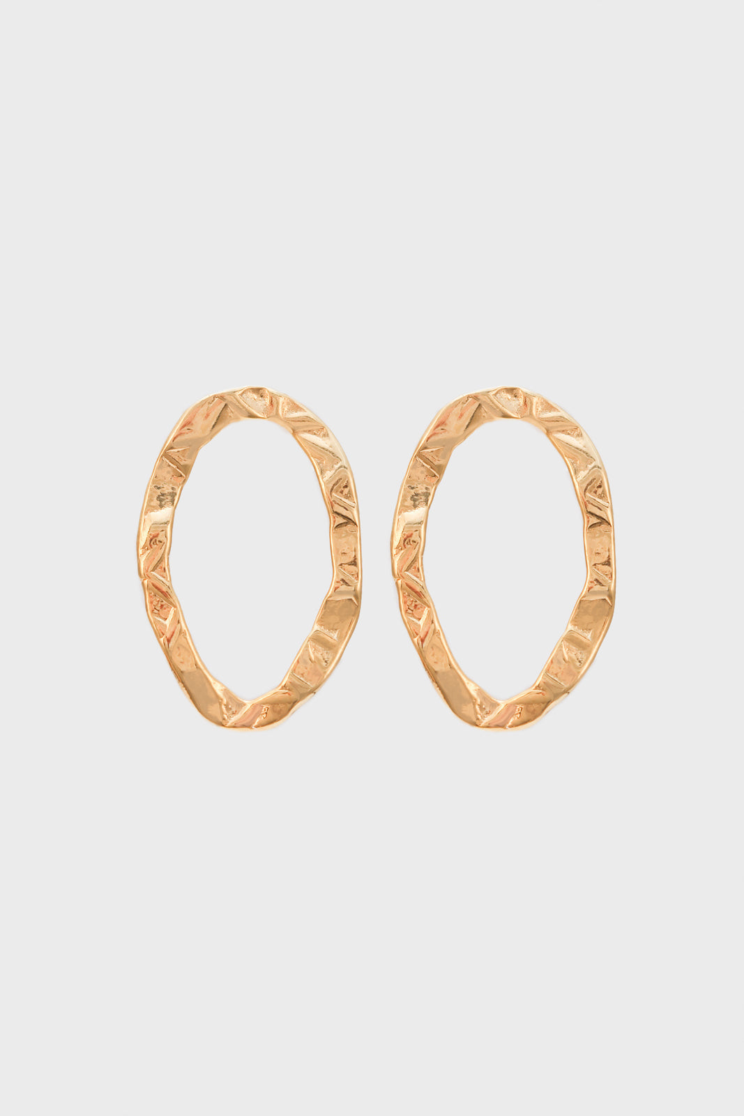 Gold flat hammered oval earrings_1