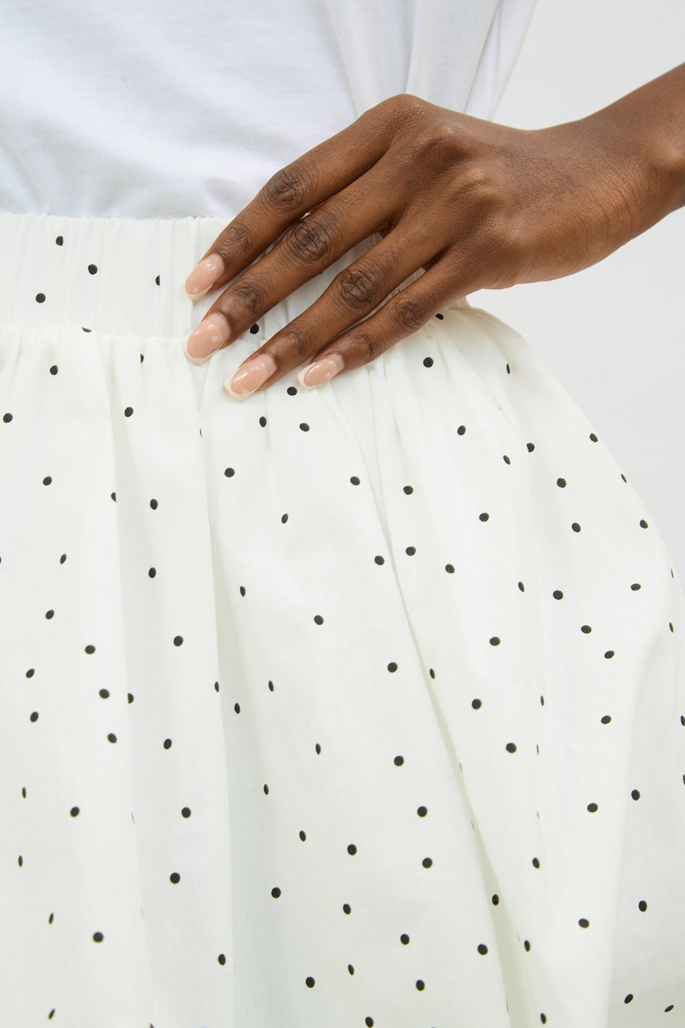 White and black polka dot mini bubble skirt