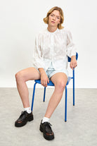 White embroidered flower round neck blouse_5