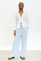 White embroidered frill trim tie front blouse_4