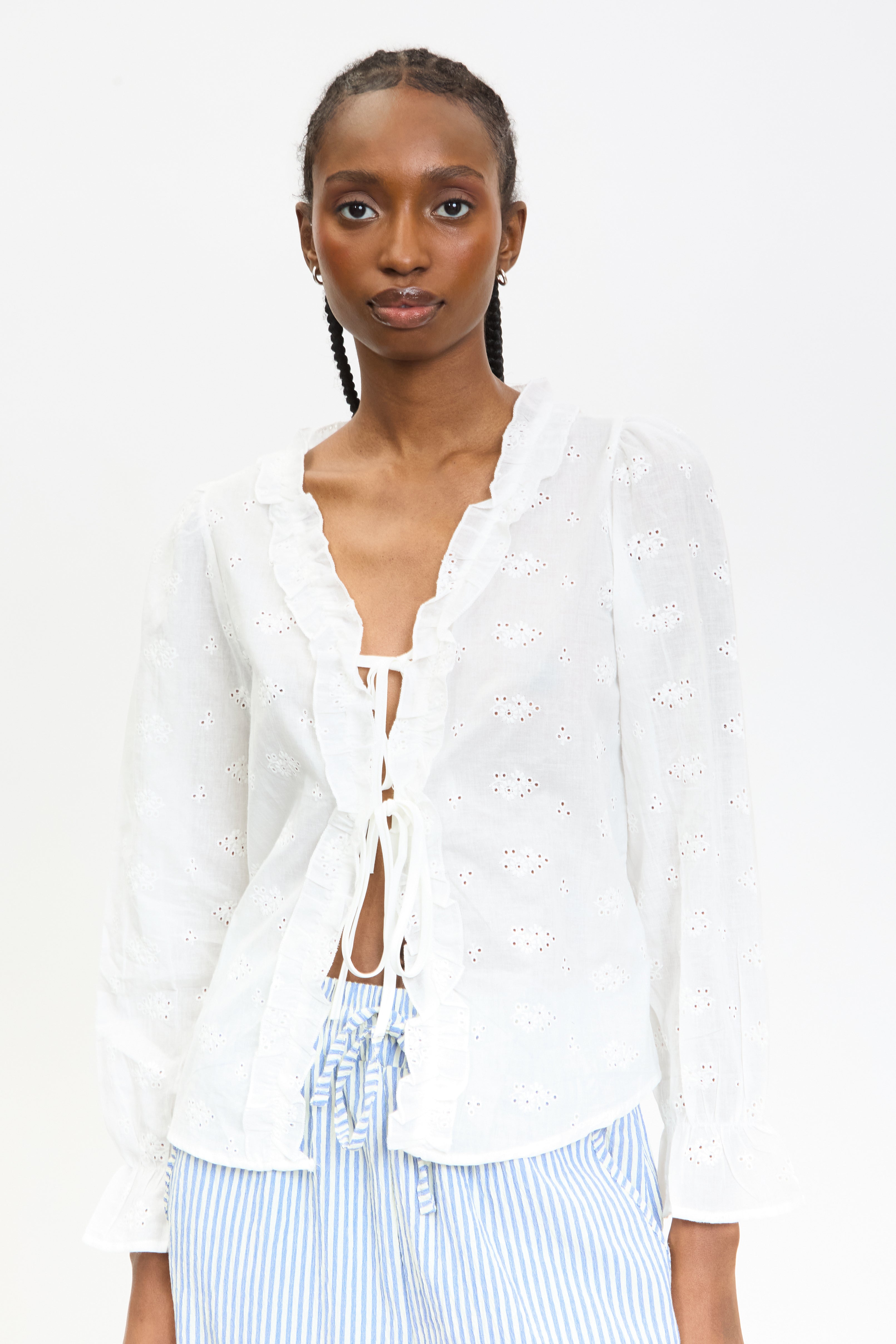 White embroidered frill trim tie front blouse | Glassworks London