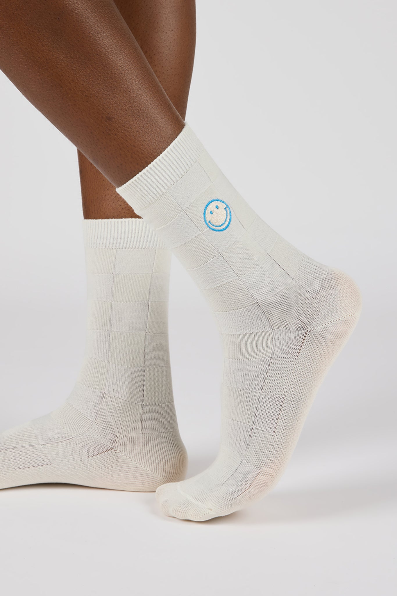 White intarsia block embroidered smiley face socks_1