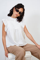 White eyelet trim sleeveless blouse_5