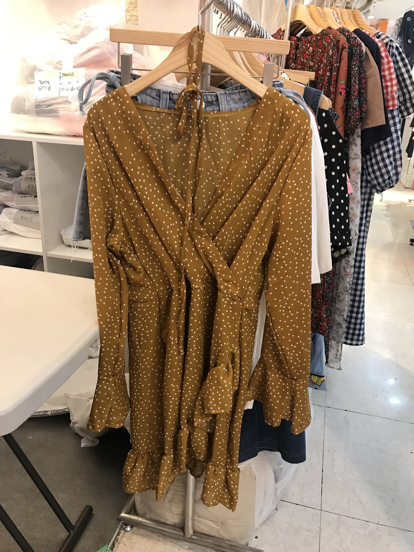 Mustard polka dot ruffle trim cross front dress_1