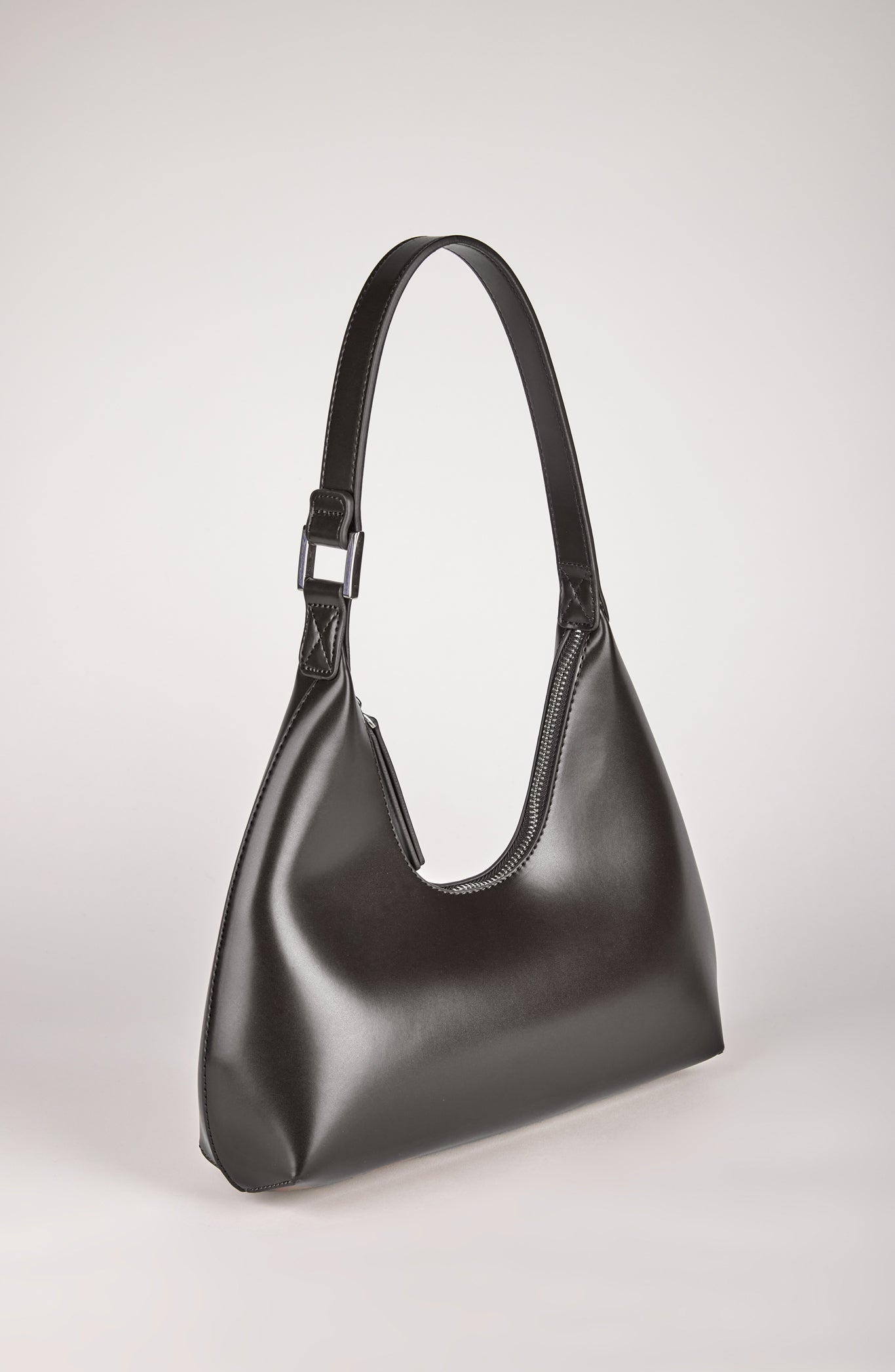 Black vegan leather shaped shoulder bag